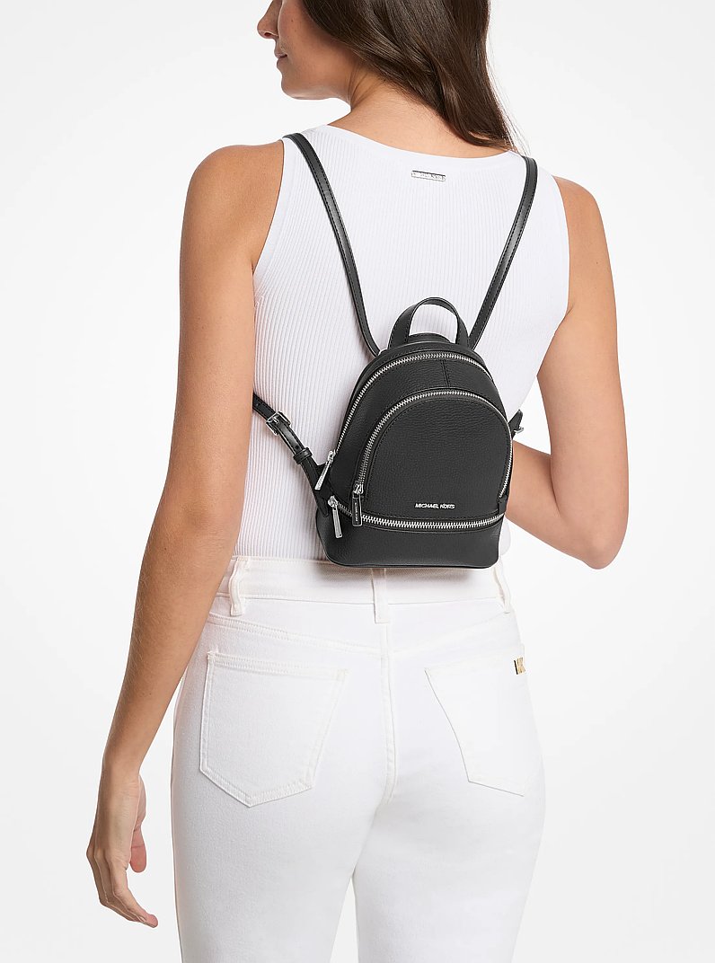 Rhea Extra-Small Pebbled Leather Backpack in NEGRO | Michael Kors