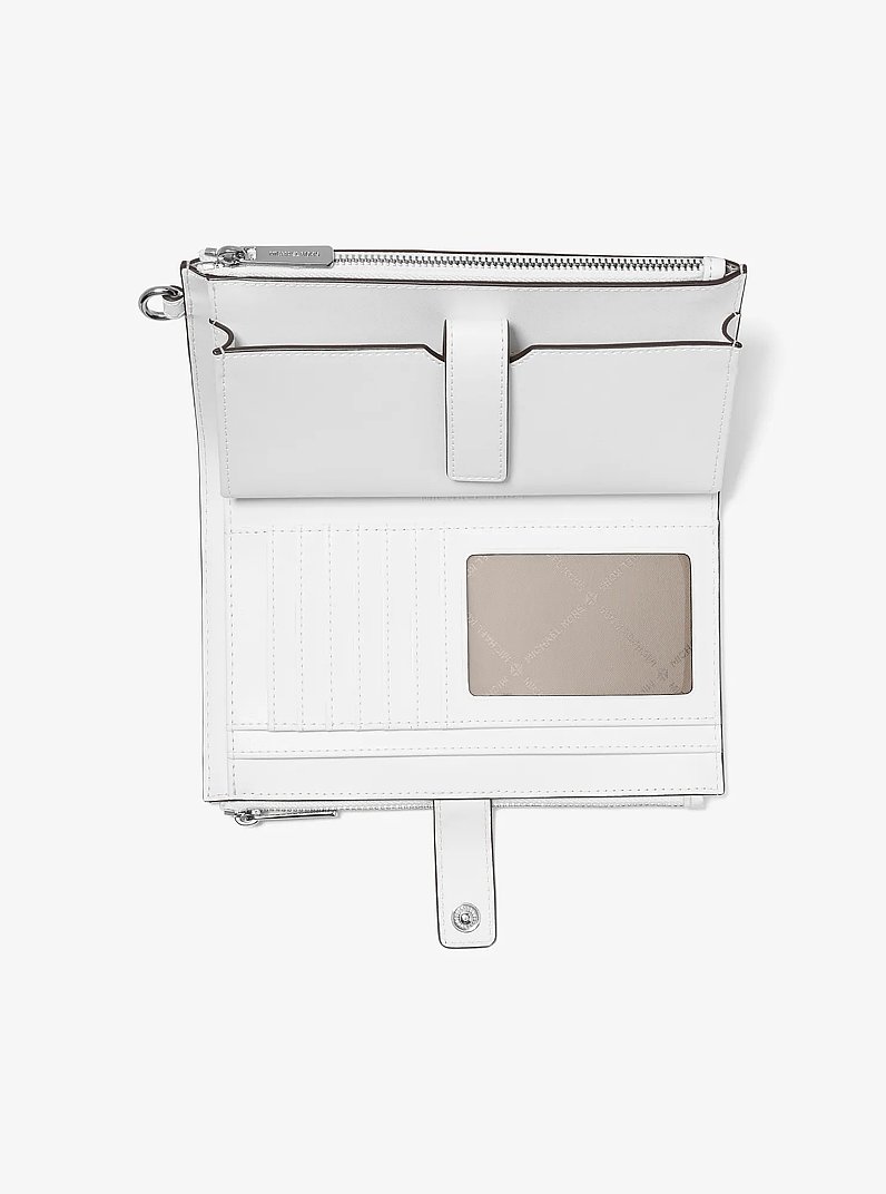 Jet Set Travel Rainbow Logo Embossed Wristlet in OPTIC WHITE | Michael Kors