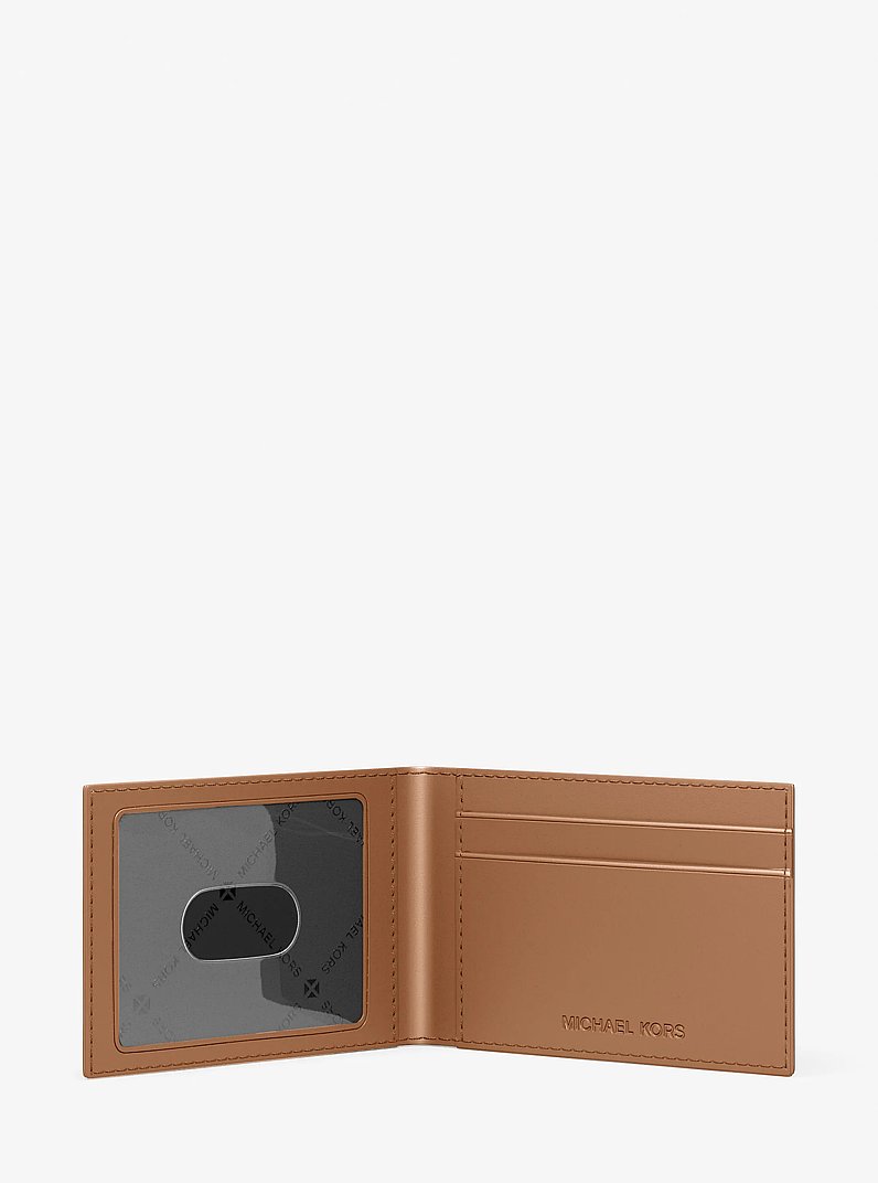 Hudson Logo Embossed Leather Billfold Wallet and Passcase in LUGGAGE | Michael Kors