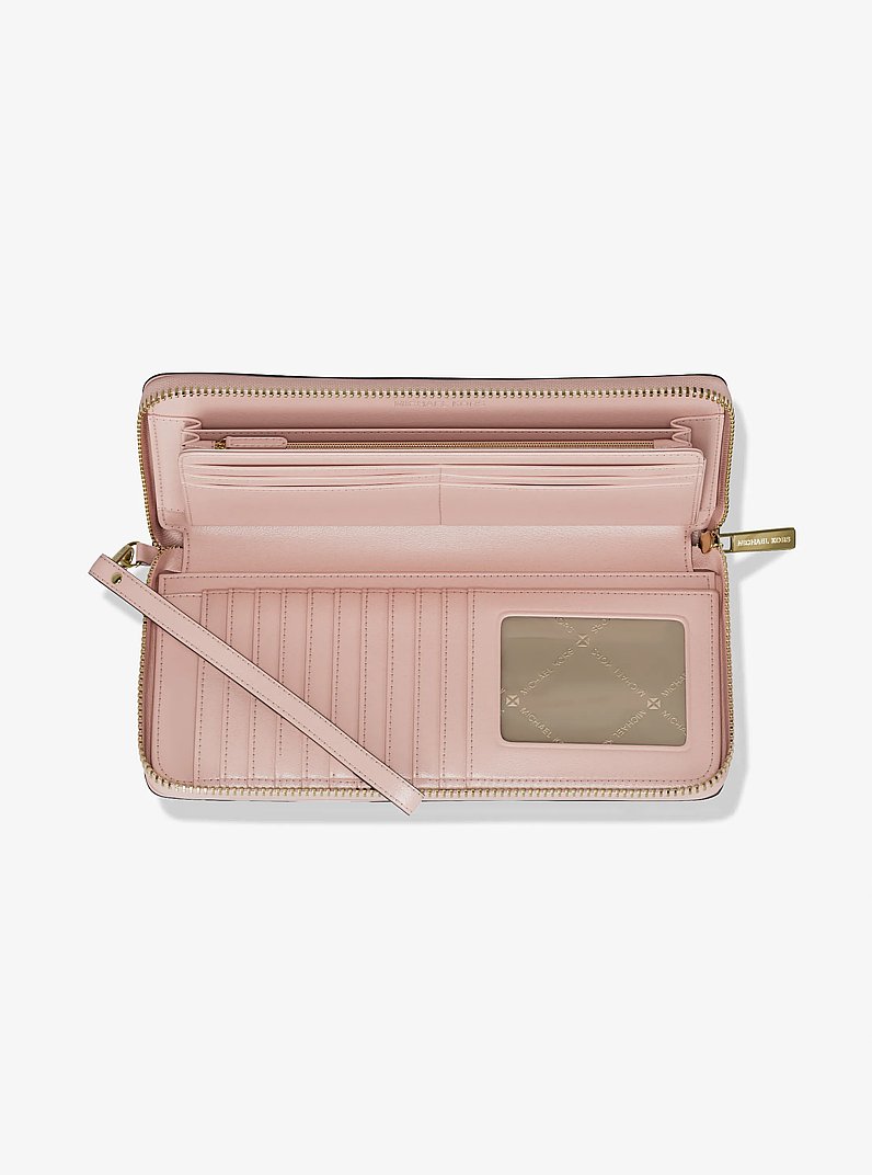 Jet Set Travel Large Signature Logo Continental Wristlet in POWDER BLUSH | Michael Kors