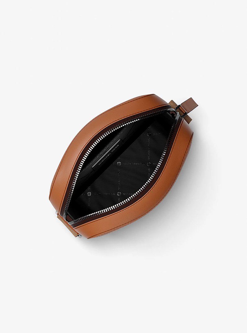 Cooper Logo Embossed Pebbled Leather Messenger Bag in LUGGAGE | Michael Kors