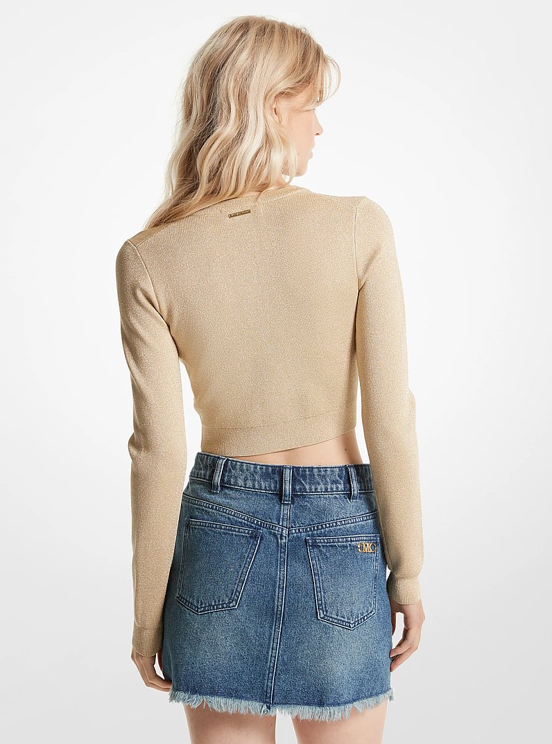 Giacca cropped in maglia metallizzata con zip