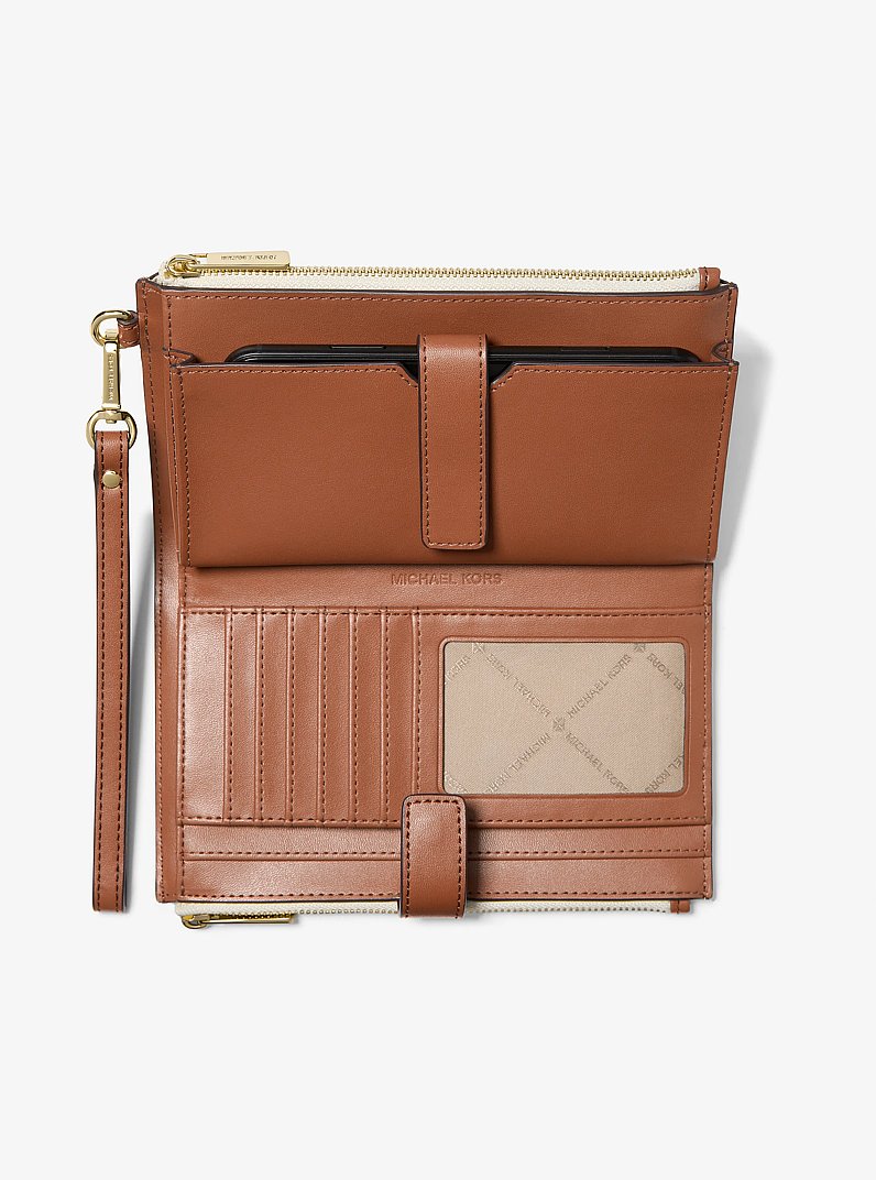 Jet Set Travel Signature Logo Smartphone Wallet in VANILLA | Michael Kors