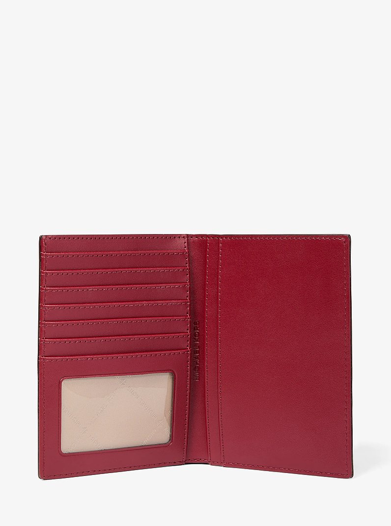 Jet Set Medium Metallic Logo Debossed Passport Wallet in CHERRY | Michael Kors