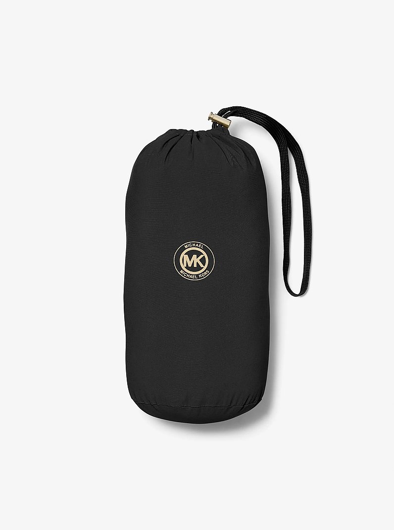 Doudoune repliable matelass&eacute;e en nylon avec bordure en fausse fourrure in NOIR | Michael Kors