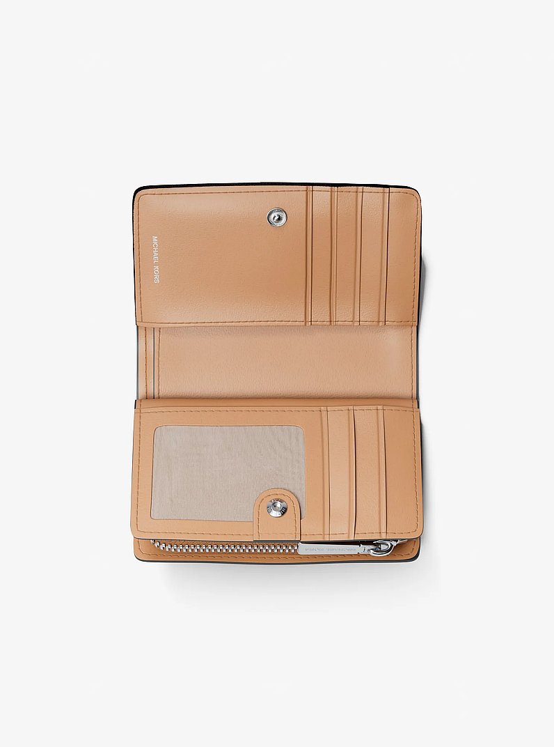 Portafoglio Bryant medio in pelle martellata in ARACHIDE | Michael Kors