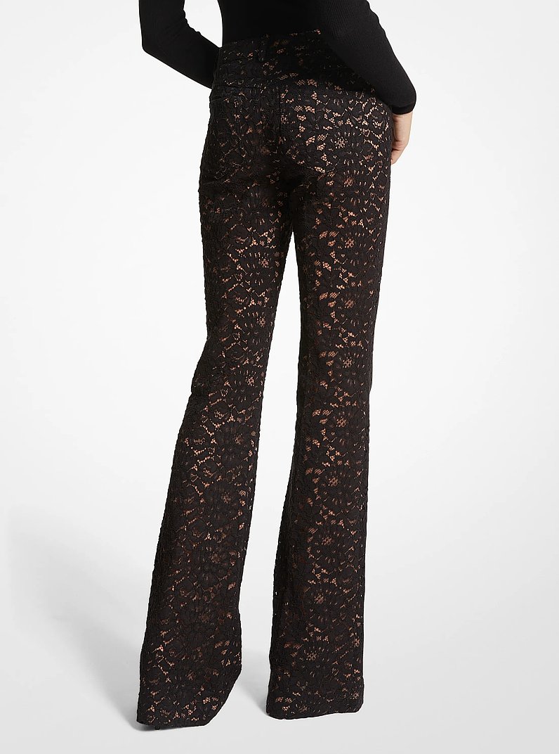 Jeans svasati in pizzo floreale cordonato in NERO | Michael Kors
