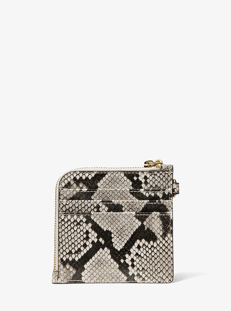 Billetera Jet Set Travel mediana con cadena y relieve de serpiente in CREMA CLARO | Michael Kors