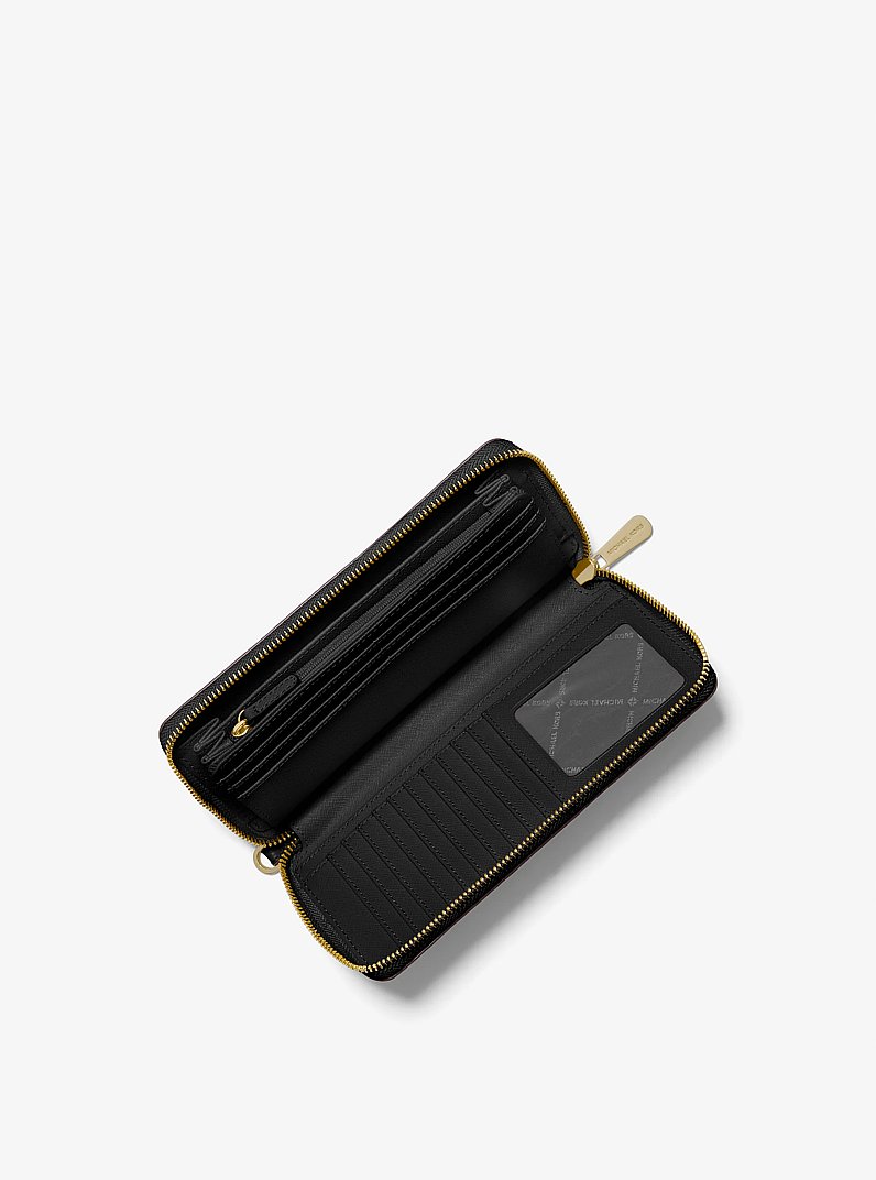 Billetera Jet Set Travel grande de piel granulada in NEGRO | Michael Kors