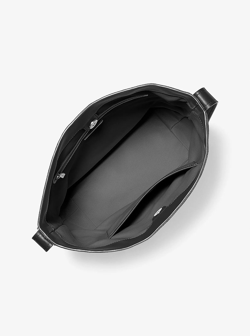Bombonera Nolita grande de ante in NEGRO | Michael Kors