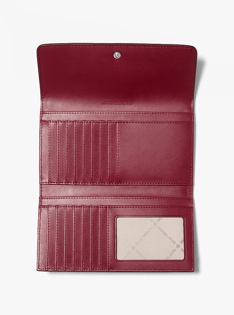 Jet Set Travel Signature Logo Tri-Fold Wallet in MAROON | Michael Kors