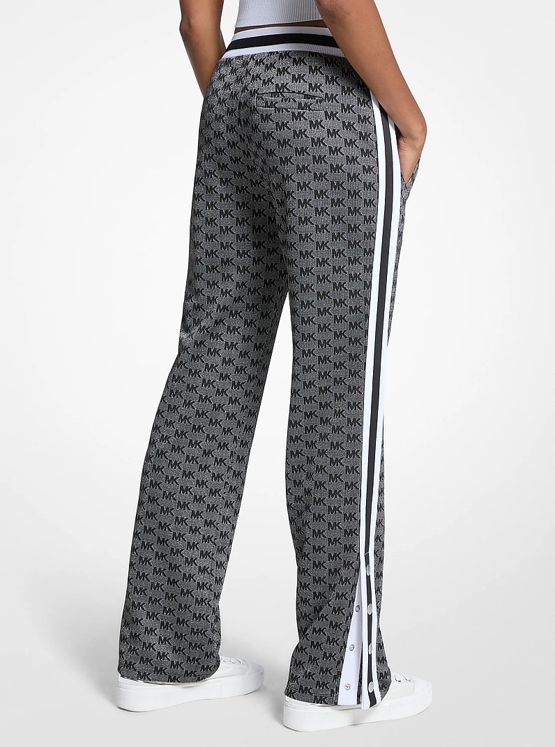 Logo Print Metallic Stretch Knit Track Pants in BLACK/SILVER