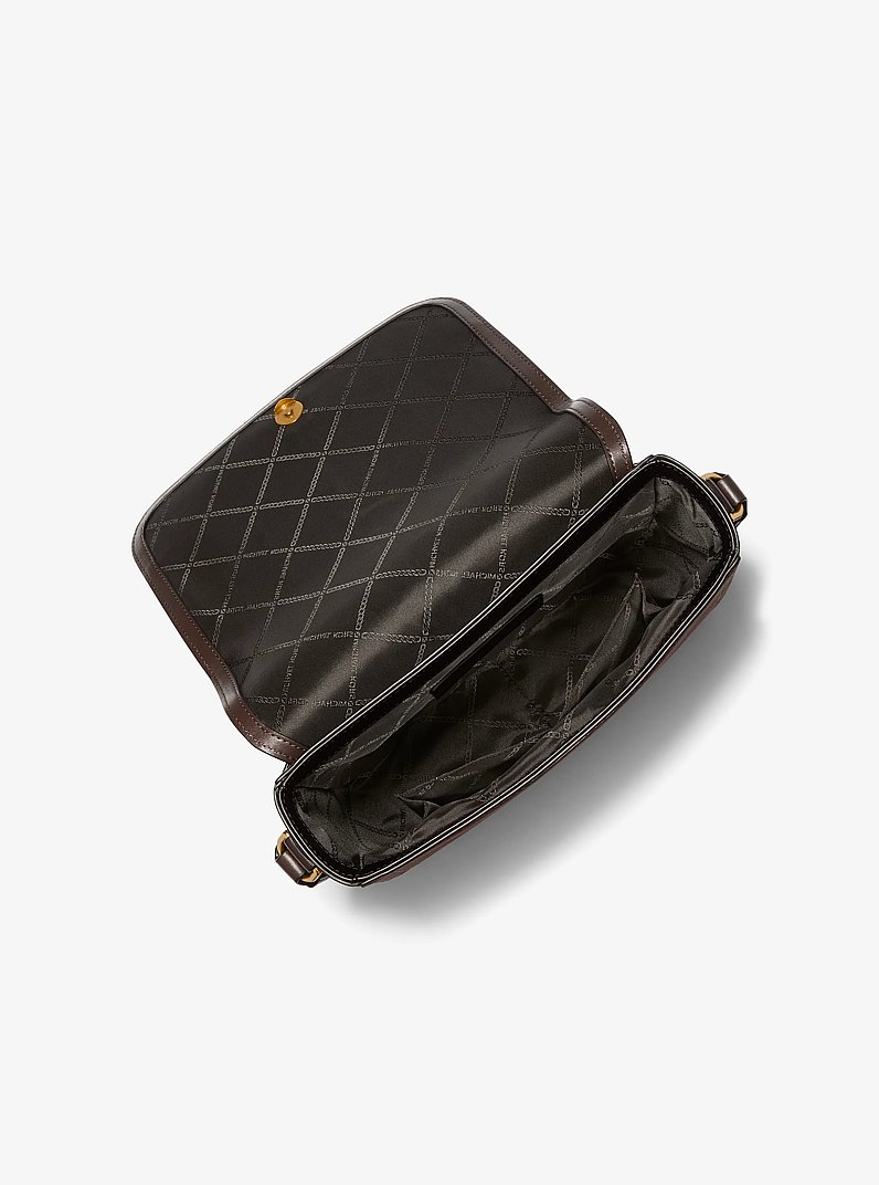 Bolso messenger Astor mediano de ante con tachuelas
