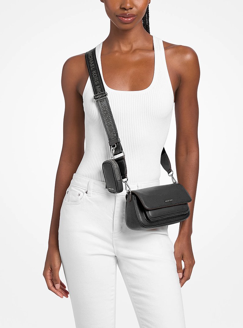 Bandolera Jet Set Travel peque&ntilde;a de piel granulada con funda in NEGRO | Michael Kors