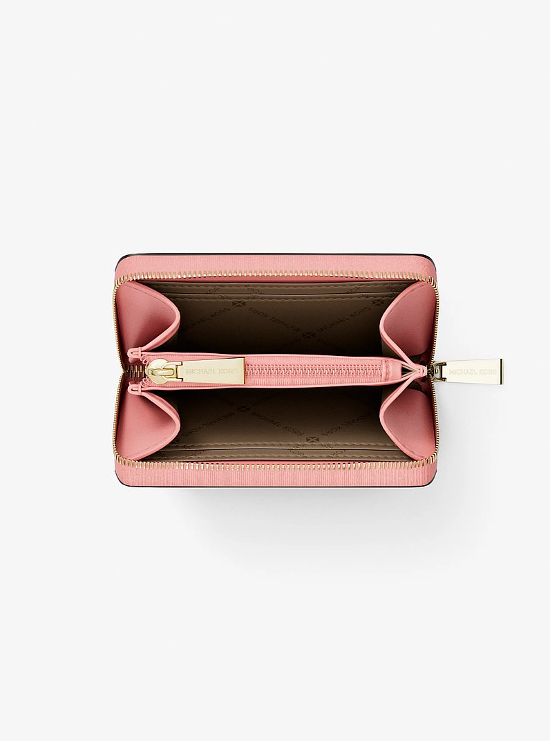 Porta carte di credito zip-around Jet Set piccolo in pelle martellata in ROSA PRIMULA | Michael Kors