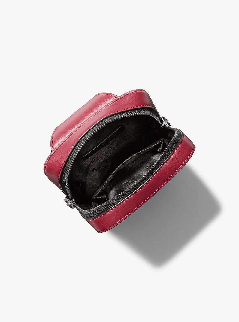 Cooper Medium Signature Logo Sling Pack in MAROON | Michael Kors