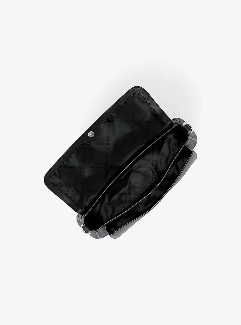 Bandolera Jet Set Travel peque&ntilde;a de piel granulada con funda in NEGRO | Michael Kors