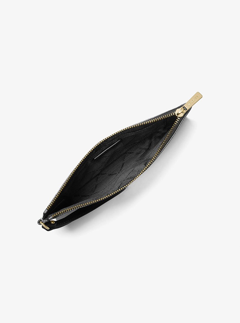 Estuche Jet Set Travel grande de cuero granulado in NEGRO | Michael Kors