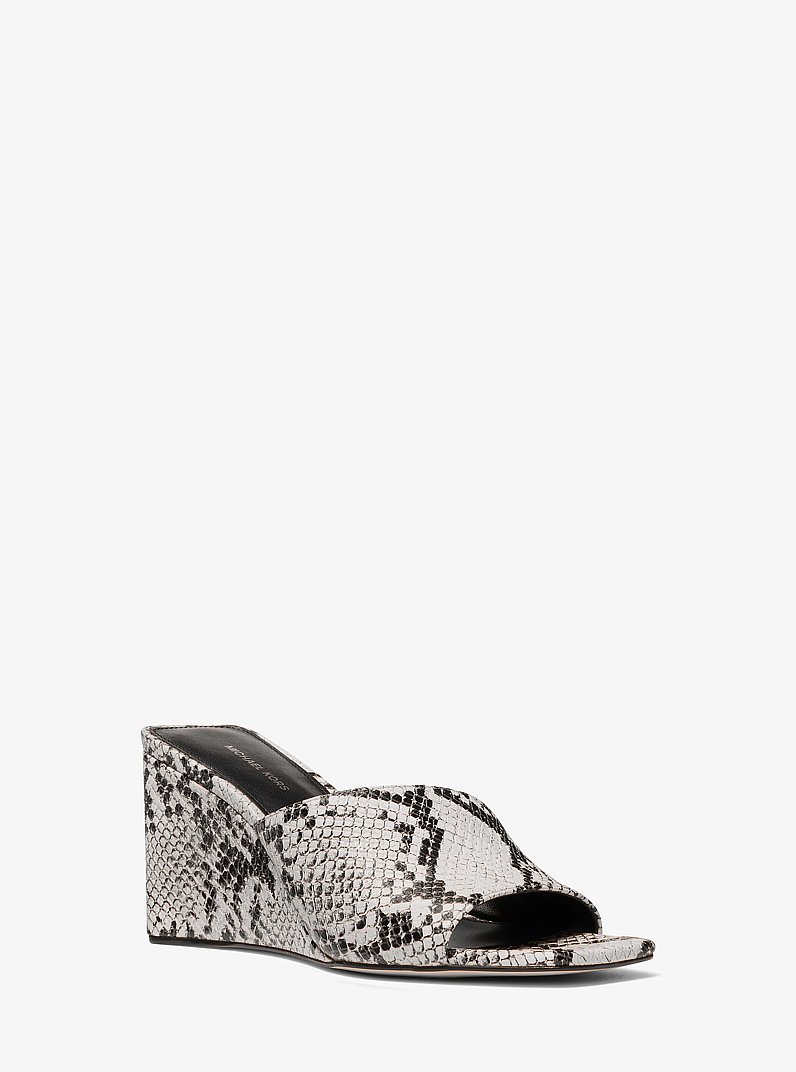 Sandalia Merriam de piel con cu&ntilde;a y motivo de serpiente en relieve in ALUMINIO | Michael Kors