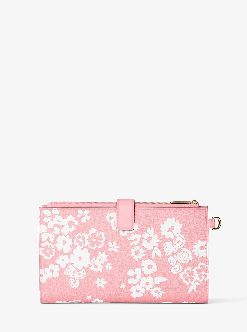 Grande pochette-bracelet Jet Set Travel &agrave; imprim&eacute; &agrave; logo Signature in &OElig;ILLET | Michael Kors