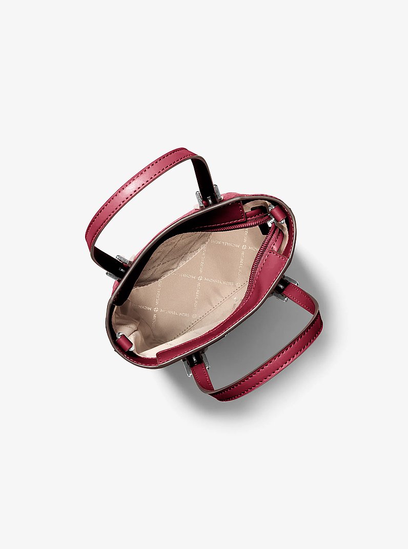 Voyager Extra-Small Signature Logo Convertible Crossbody Bag in MAROON | Michael Kors