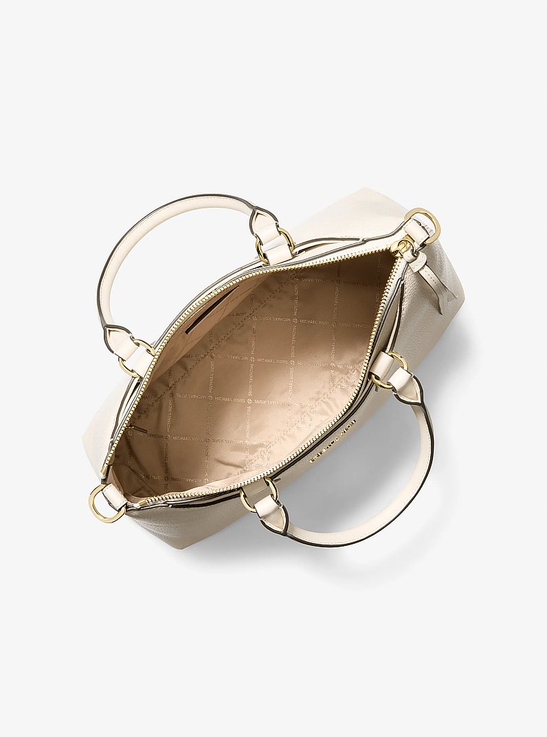 Bolso satchel Austen mediano de piel in CREMA CLARO | Michael Kors