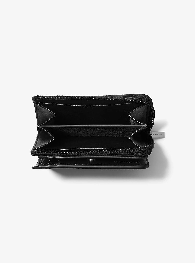 Billetera tipo folio Cooper con logotipo Signature in NEGRO | Michael Kors