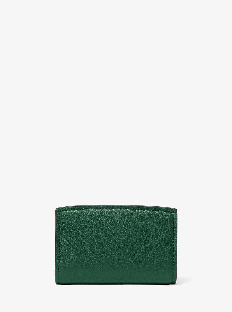 Portafoglio Bryant medio in pelle martellata in MUSCHIO | Michael Kors