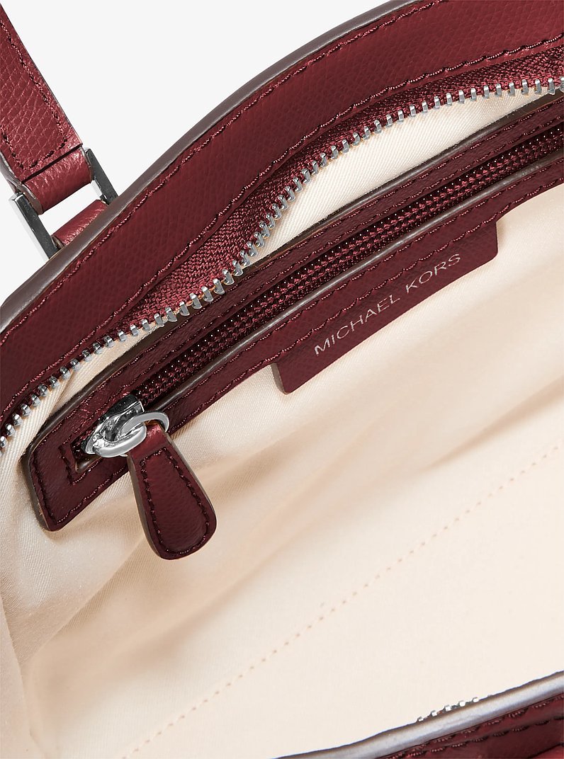 Bolsa cruzada Taryn peque&ntilde;a de cuero transformable in GUINDA | Michael Kors