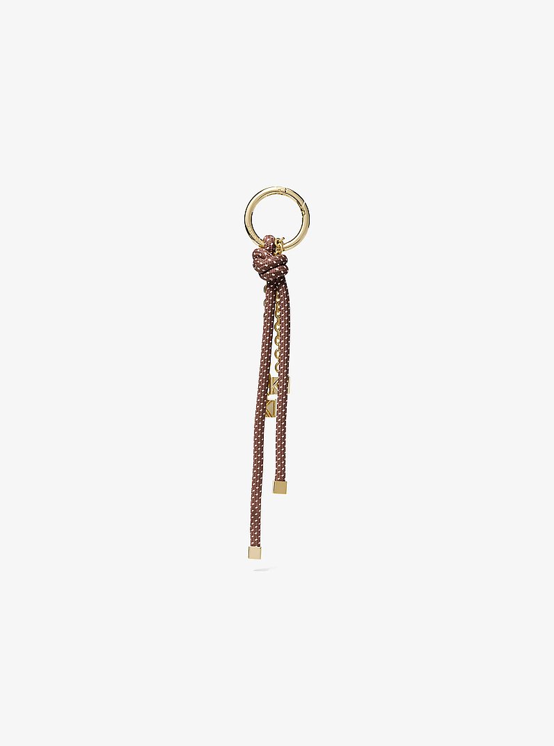 Breloque de sac dor&eacute;e avec cordon mouchet&eacute; in CHOCOLAT | Michael Kors