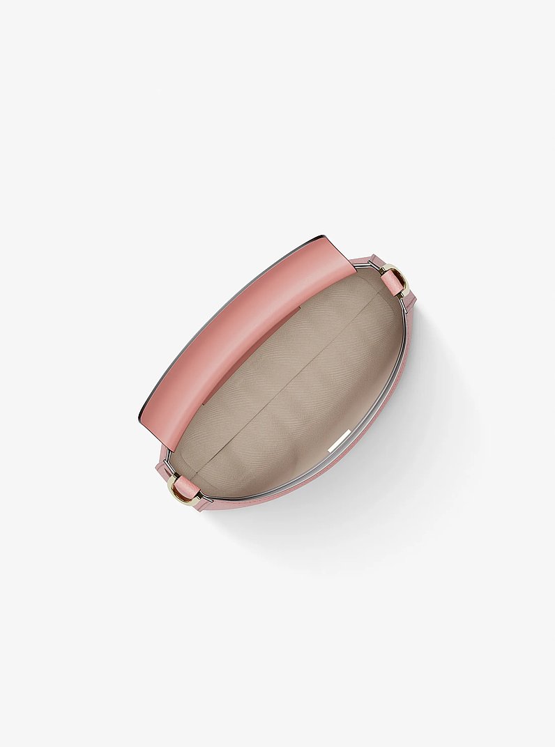 Bolso pochette Bryant peque&ntilde;o convertible de piel granulada in PRIMROSE | Michael Kors