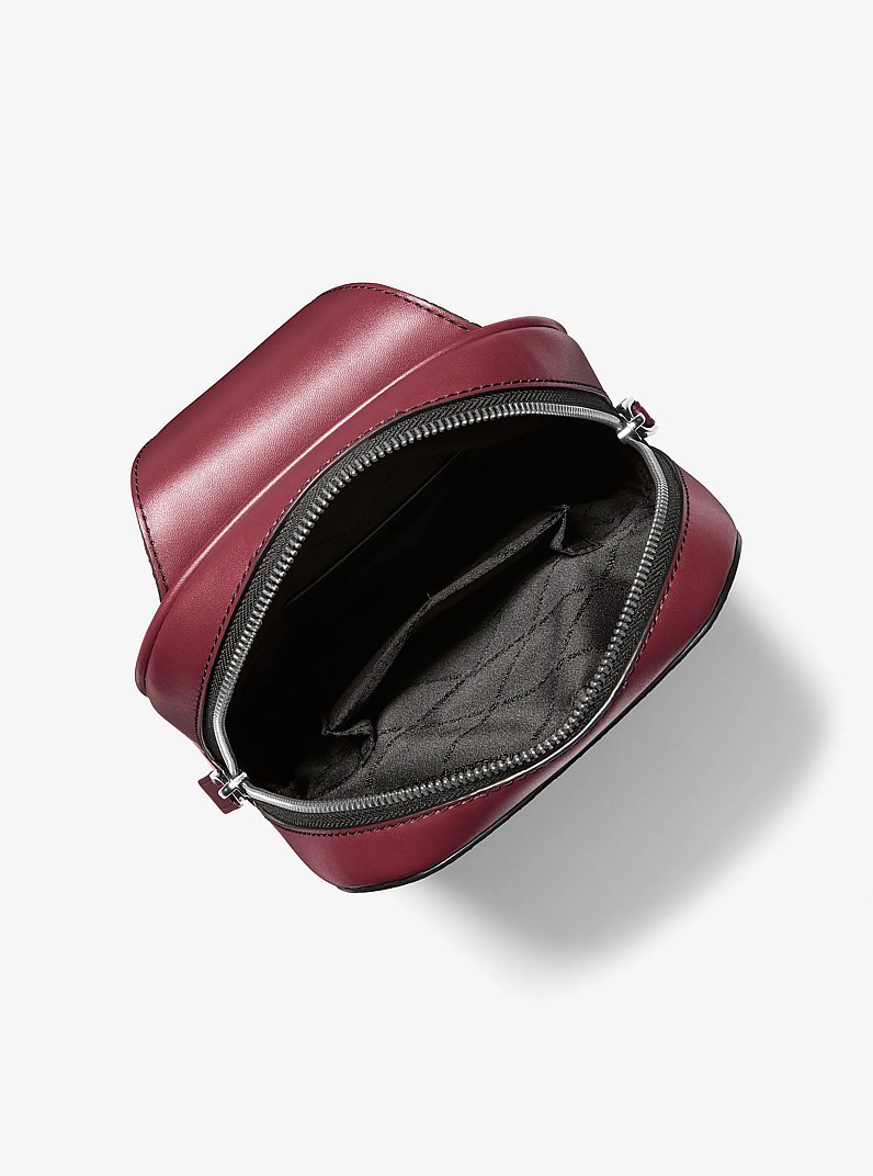 Cooper Slim Pebbled Leather Commuter Sling Pack in OXBLOOD | Michael Kors