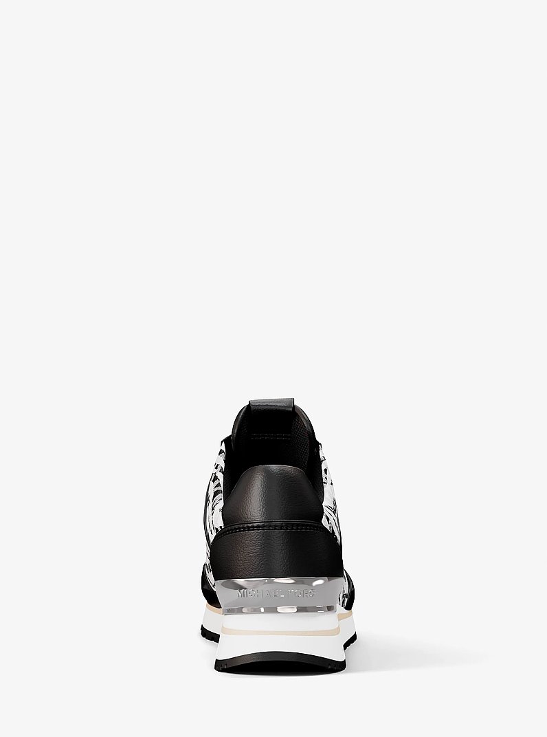 Espadrille Maddy &agrave; imprim&eacute; de z&egrave;bre et &agrave; logo Signature in COMBINAISON NOIRE | Michael Kors