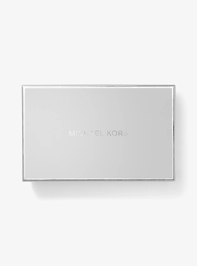 Portofel Nolita mediu pliabil cu trei secțiuni din piele metalizată cu aspect crăpat in AURIU DESCHIS | Michael Kors