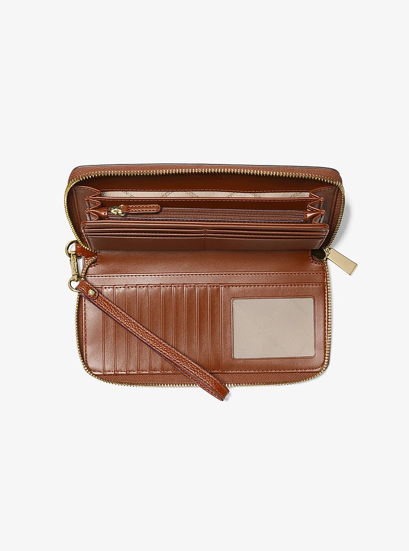 Jet Set Travel Large Pebbled Leather Continental Wallet in LUGGAGE | Michael Kors
