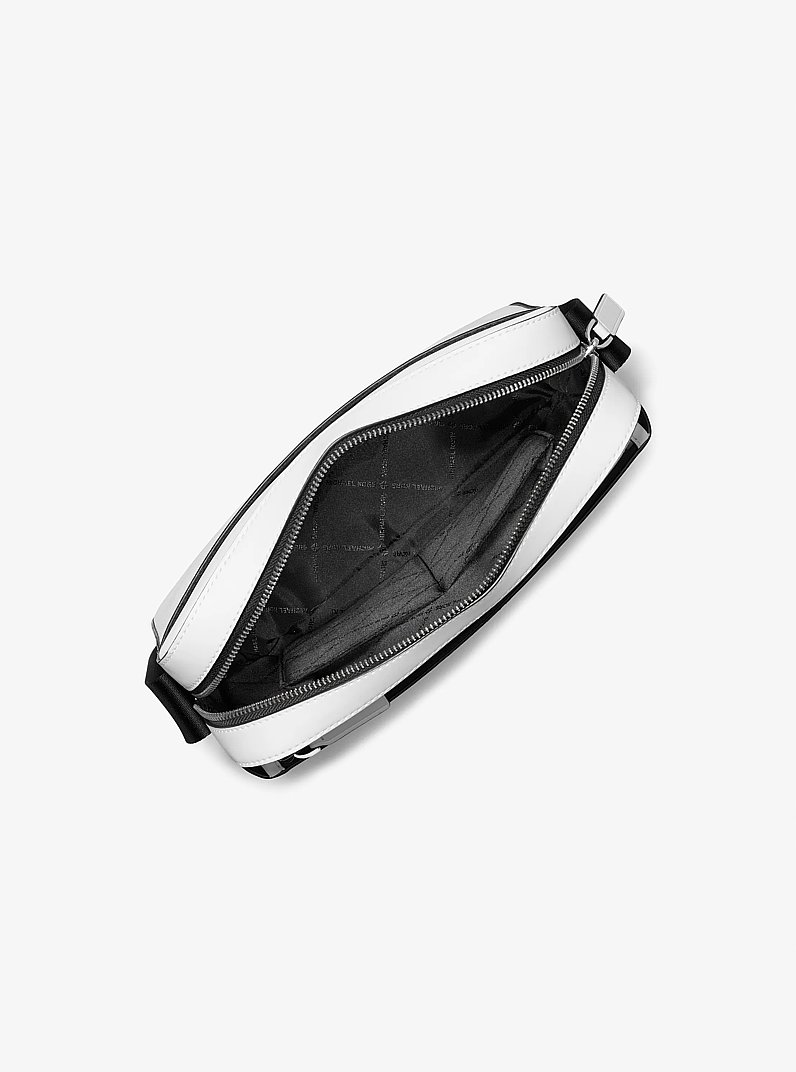 Bandolera utilitaria Cooper de piel saffiano in BLANCO BRILLANTE | Michael Kors