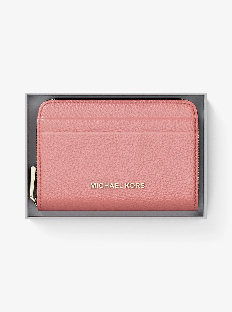 Porta carte di credito zip-around Jet Set piccolo in pelle martellata in ROSA PRIMULA | Michael Kors