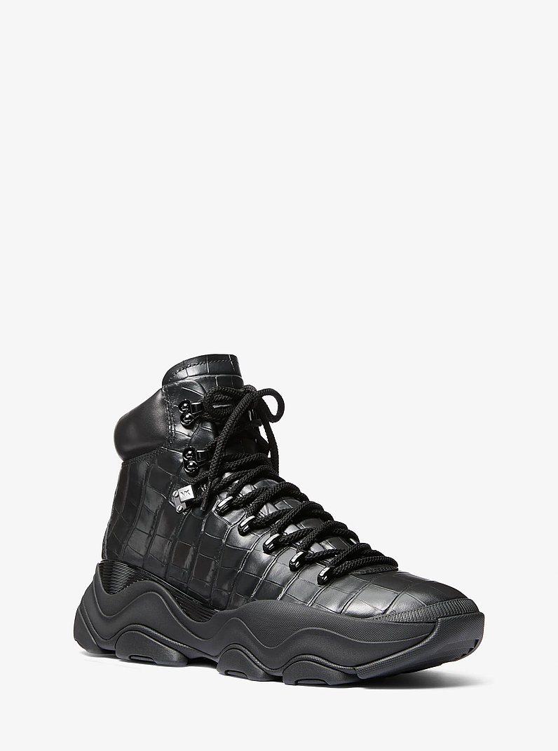 Botte Atlas en cuir gaufr&eacute; &agrave; motif de crocodile in NOIR | Michael Kors