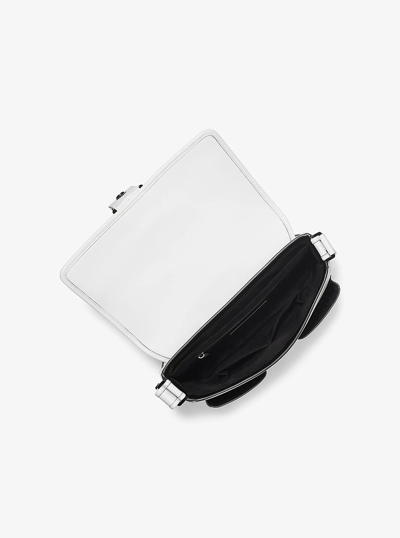 Colby Medium Grommeted Leather Messenger Bag in OPTIC WHITE/BLK | Michael Kors