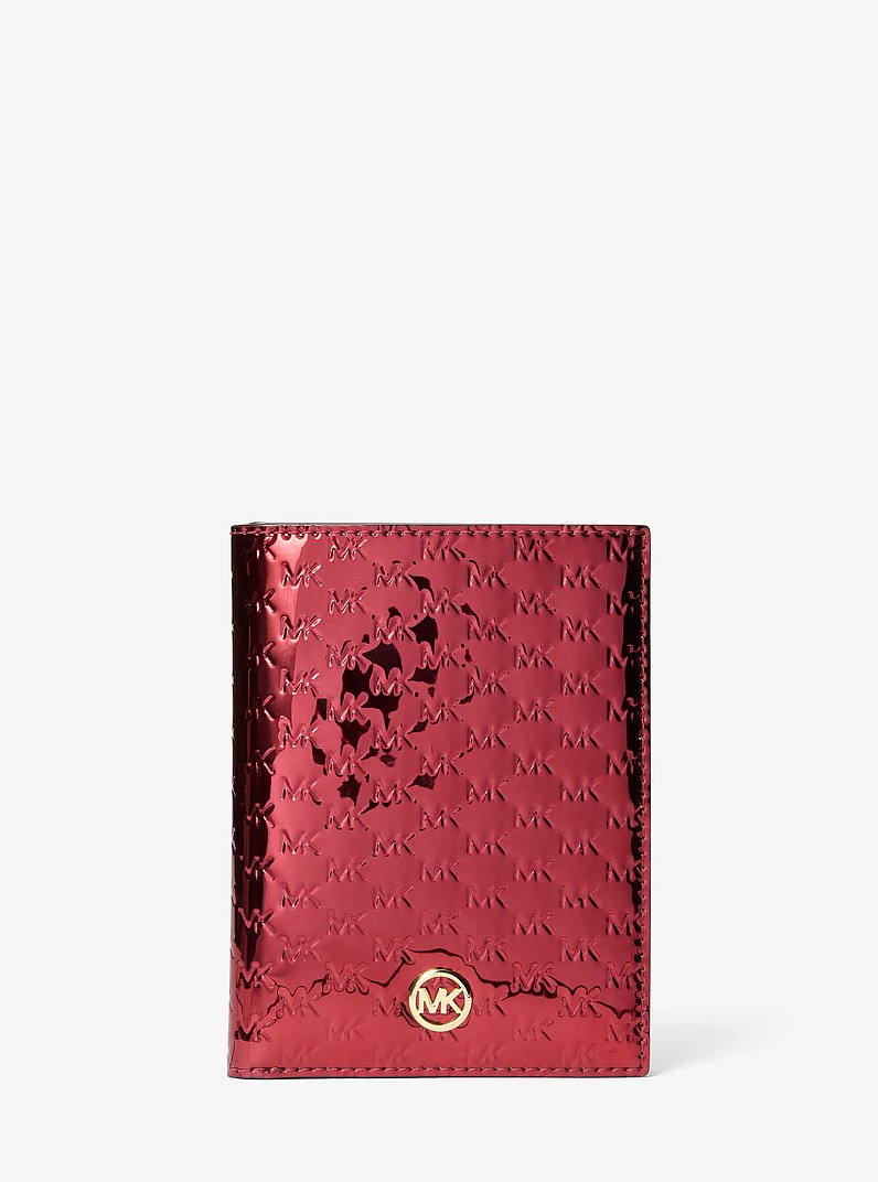 Jet Set Medium Metallic Logo Debossed Passport Wallet in CHERRY | Michael Kors