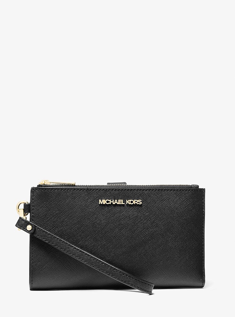 Cartera Jet Set grande de piel con tira de mu&ntilde;eca y compartimento para smartphone in NEGRO | Michael Kors