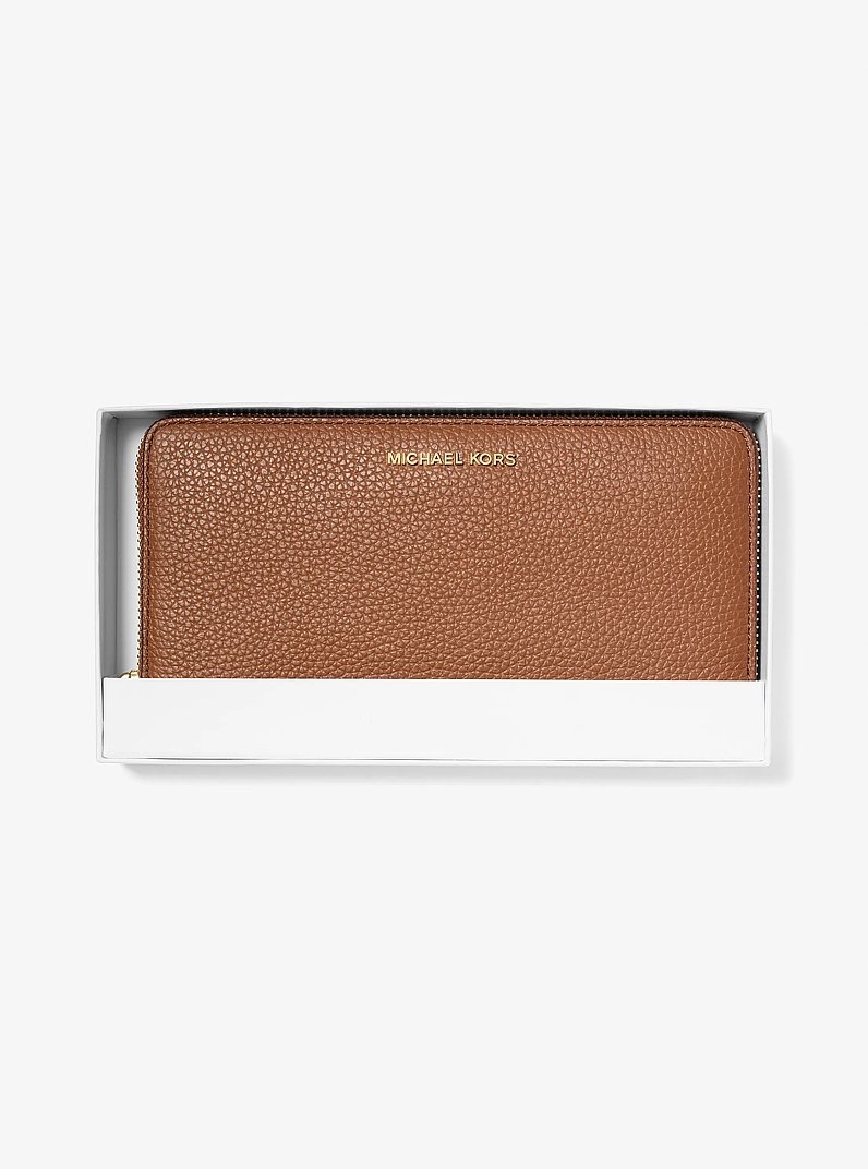Cartera Jet Set grande de piel granulada in LUGGAGE | Michael Kors