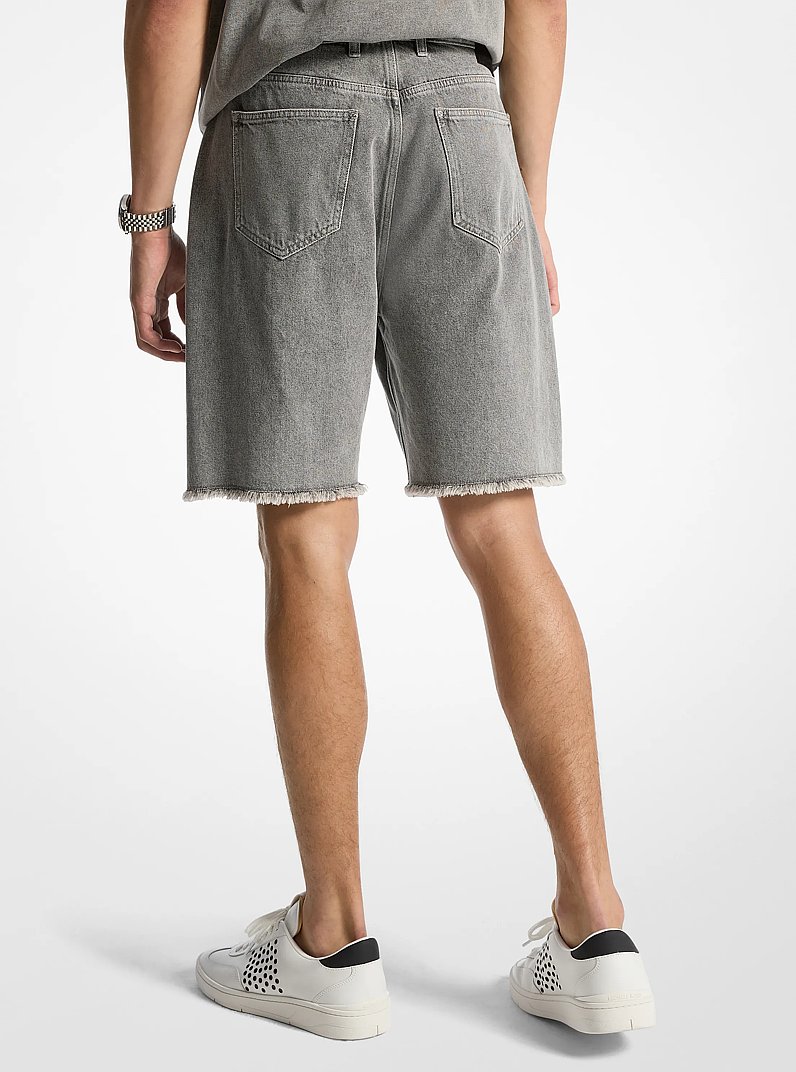 Short en denim effiloch&eacute; in LAVAGE DU B&Eacute;TON | Michael Kors