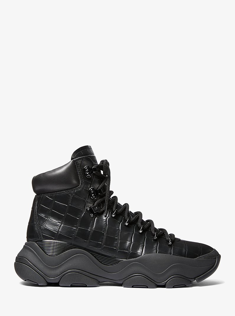 Botte Atlas en cuir gaufr&eacute; &agrave; motif de crocodile in NOIR | Michael Kors