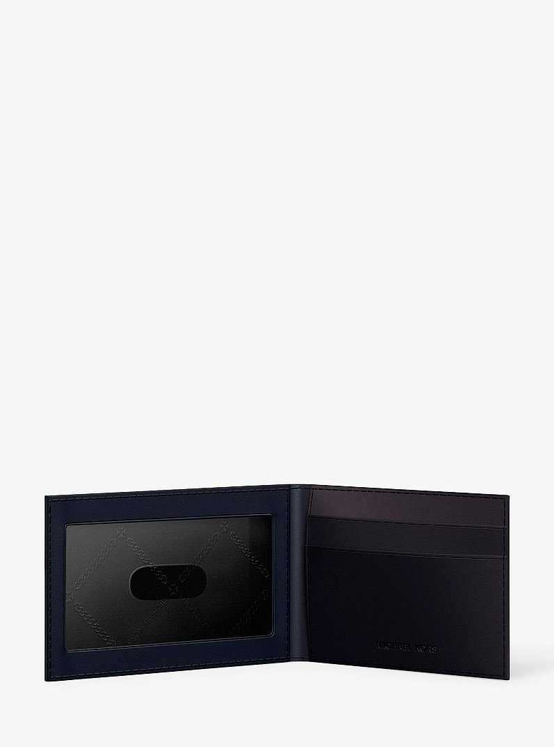 Billetera Cooper de piel saffiano con solapa para documento de identificaci&oacute;n in AZUL MARINO | Michael Kors