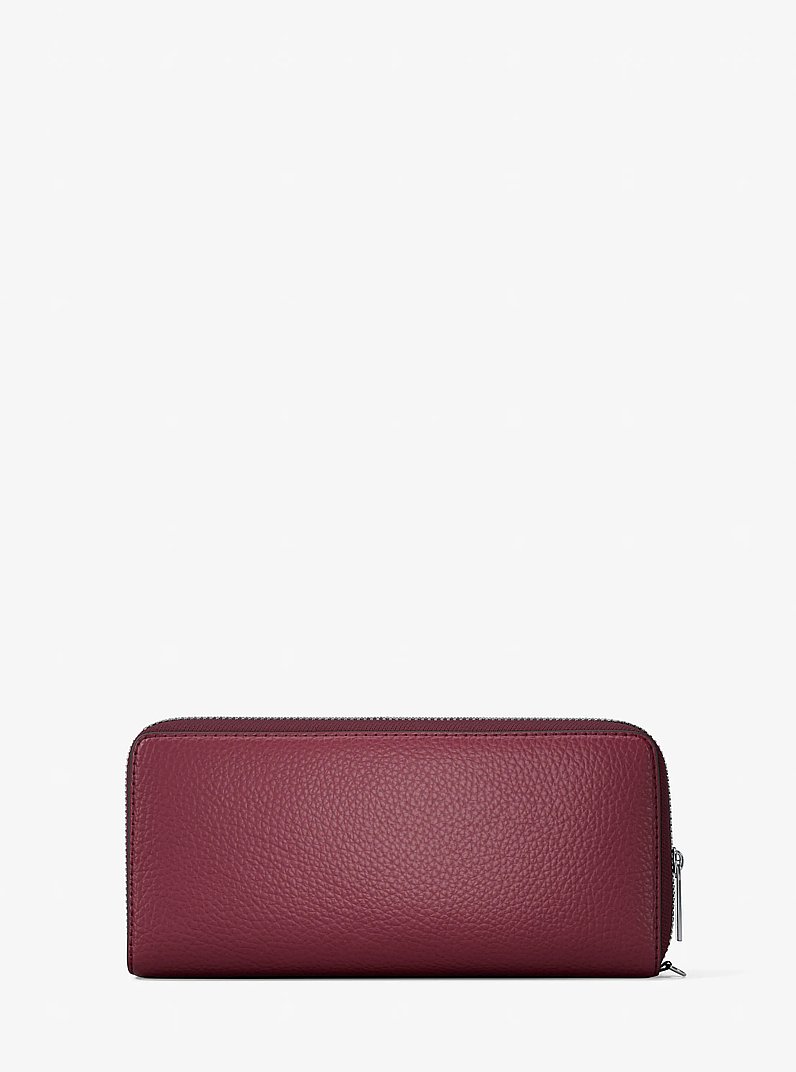 Large Pebbled Leather Continental Wallet in MAROON | Michael Kors