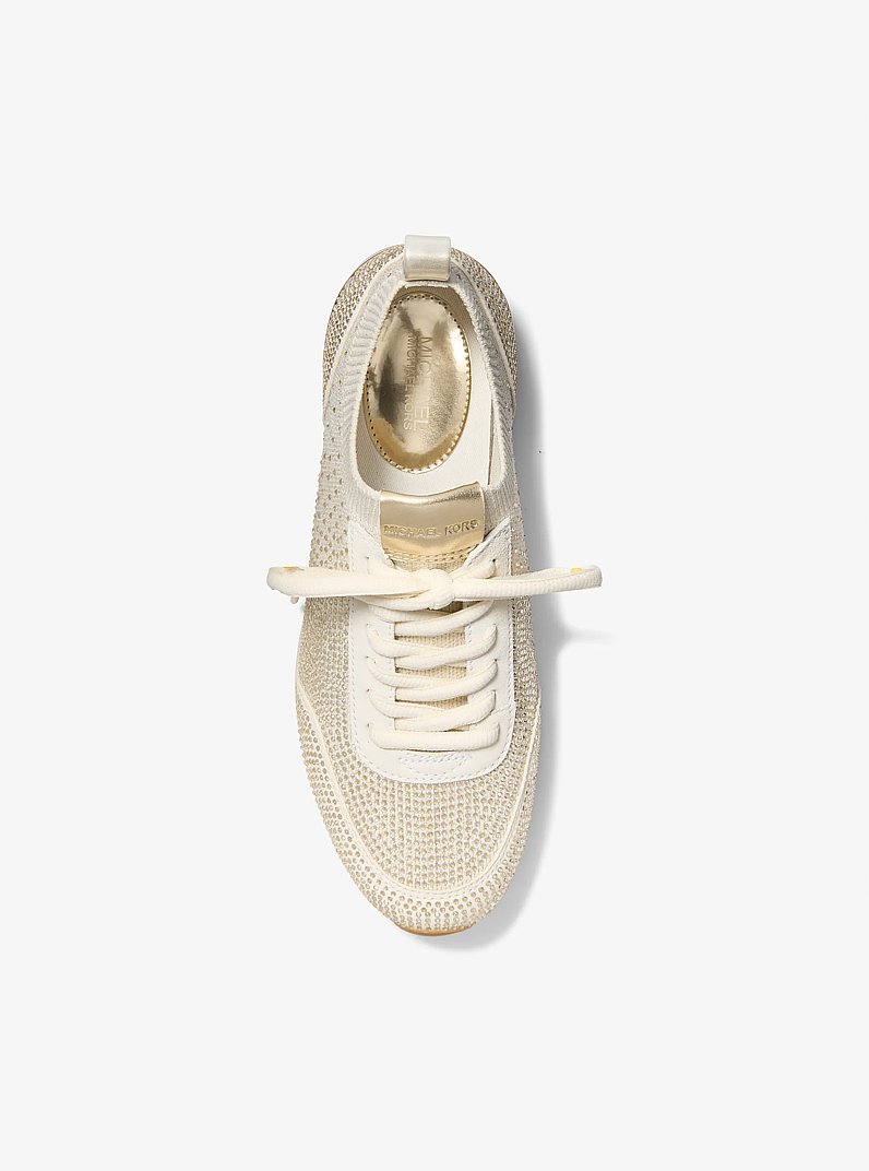 Zapatilla Jenkins de punto el&aacute;stico met&aacute;lica con adornos de cristal in DORADO P&Aacute;LIDO | Michael Kors