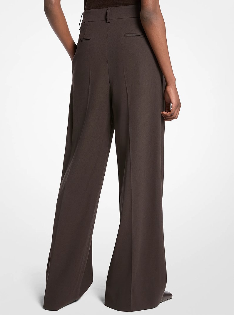 Pantalon ample en laine extensible &agrave; plis