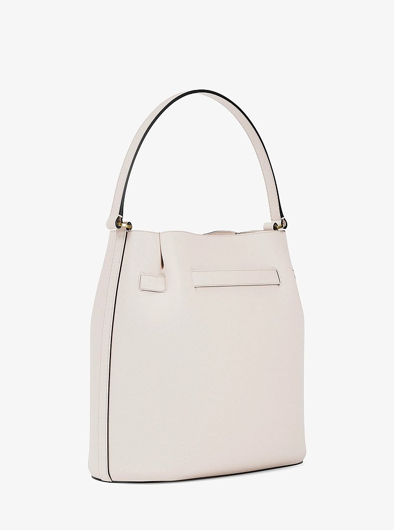 Bandolera Carson tipo bombonera convertible mediana de piel granulada in CREMA CLARO | Michael Kors