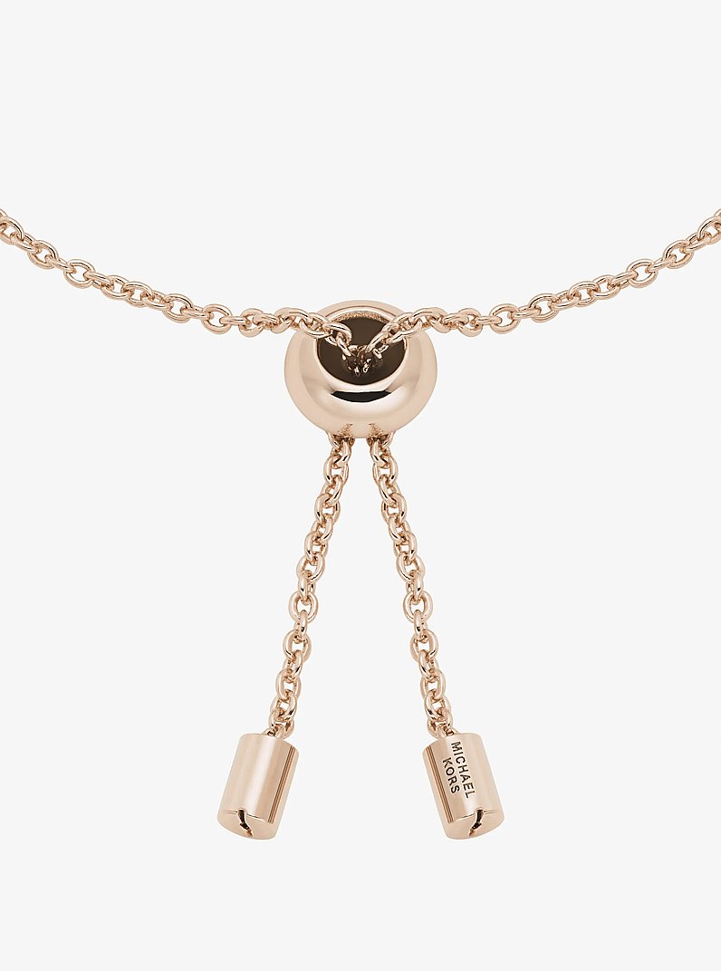 Pulsera deslizante en pav&eacute; con barra in DORADO ROSA | Michael Kors